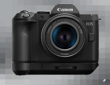 Canon EOS R8 Mark II front view with RF 24-50mm kit lens and extension grip