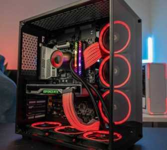 Mid-tower gaming PC build with RGB fans and tempered glass side panel