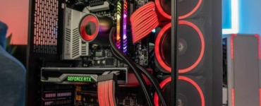 Mid-tower gaming PC build with RGB fans and tempered glass side panel