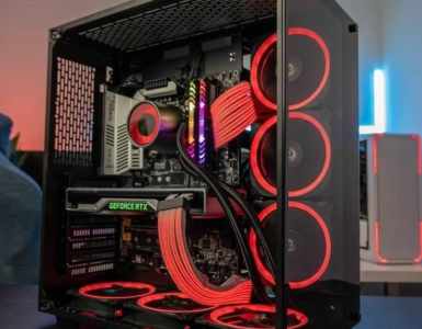 Mid-tower gaming PC build with RGB fans and tempered glass side panel