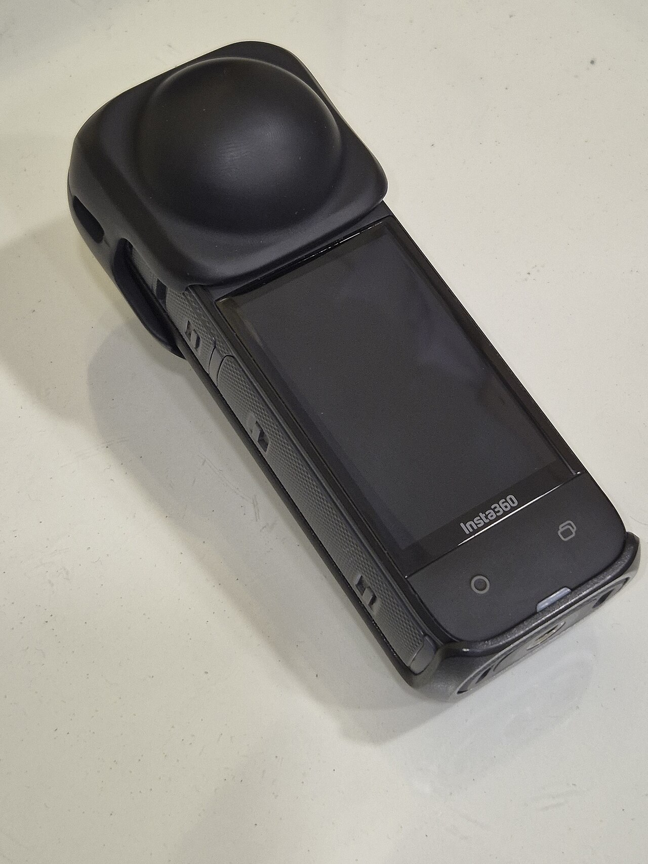 Insta360 X4 price in Pakistan - close view of the Insta360 X4 camera body and touchscreen