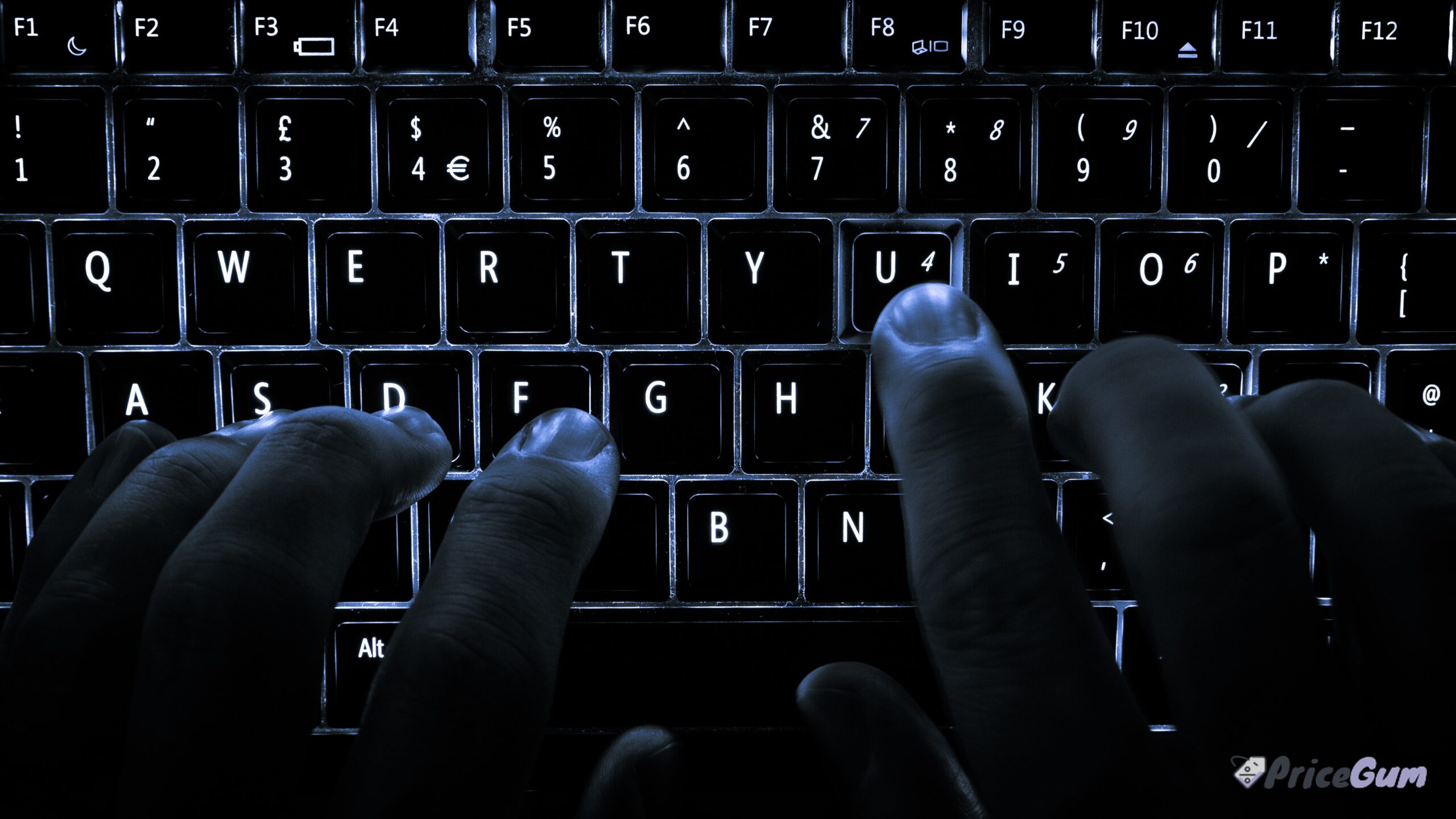 Backlit laptop keyboard close up