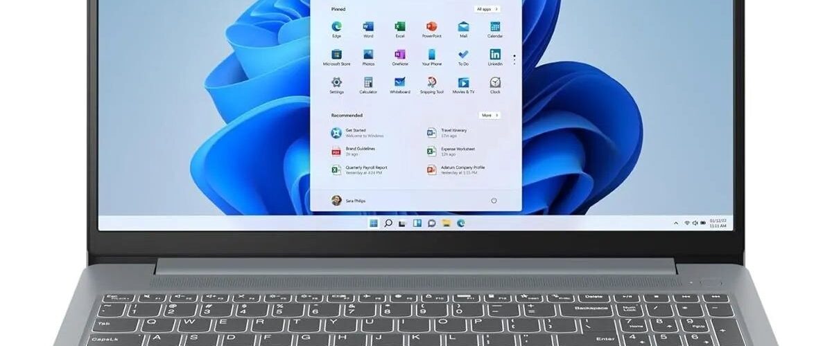 Lenovo IdeaPad Slim 3 15.6 inch laptop in Arctic Grey, front view with Windows 11 screen