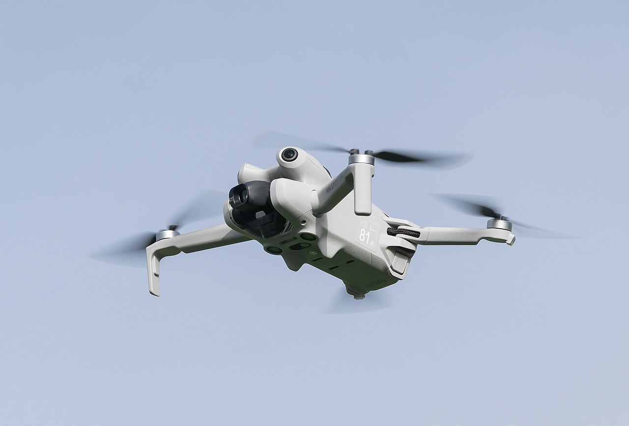 DJI Mini 4 Pro flying in the sky, dji mini 4 pro price in pakistan