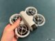 DJI Neo drone held in hand, dji neo price in pakistan