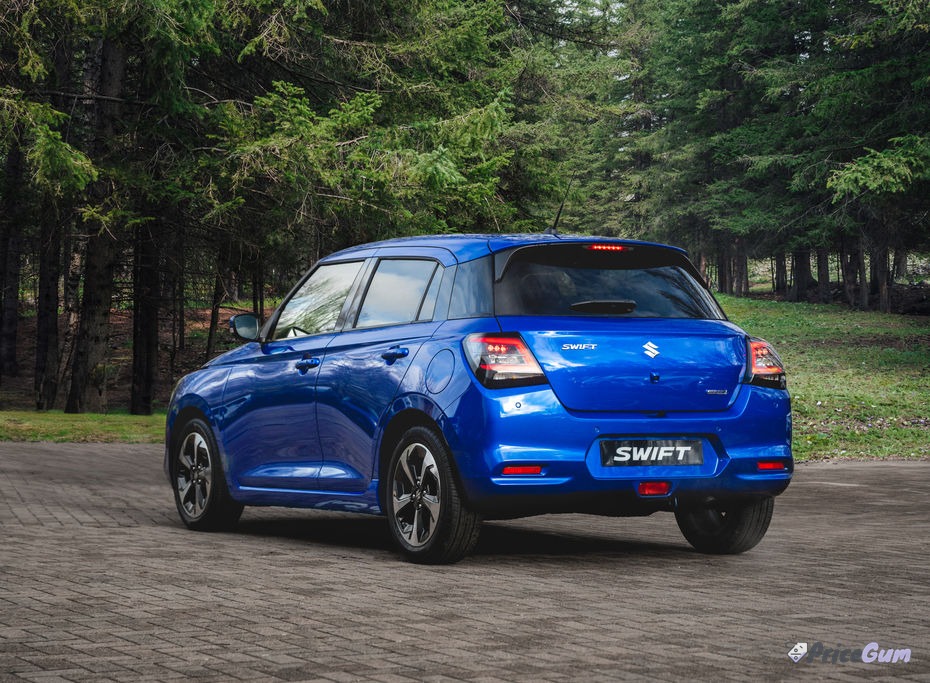 Suzuki Swift blue hatchback seen from the rear