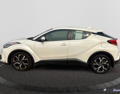 Toyota C-HR white compact crossover side view