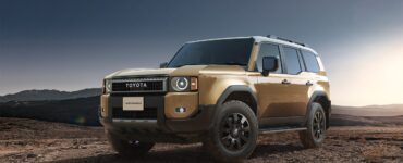 Toyota Land Cruiser Prado LC250 front three-quarter view in desert